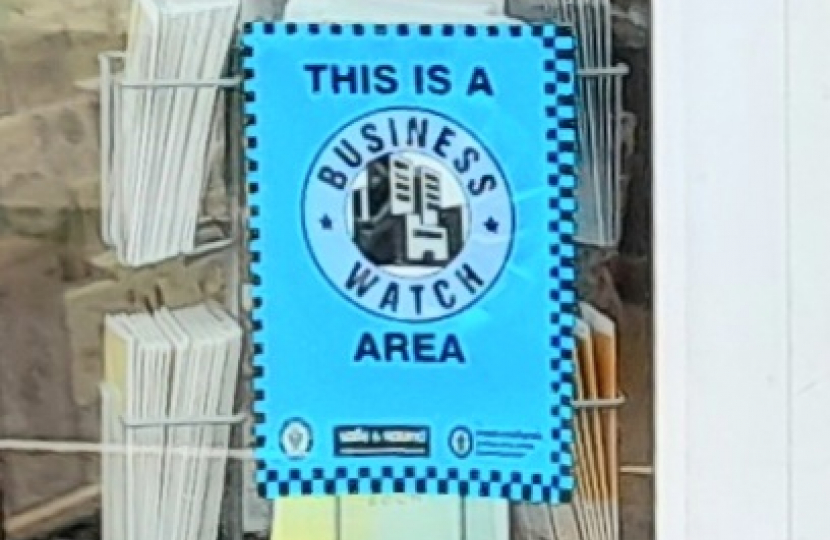 Business watch sign