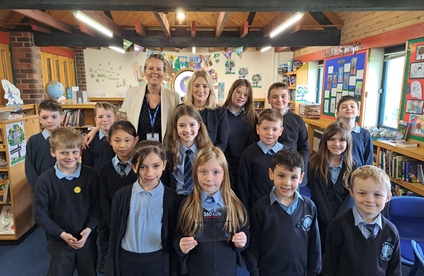 Suzanne Webb MP with the headteacher and pupils