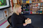 Suzanne Webb MP reading to pupils